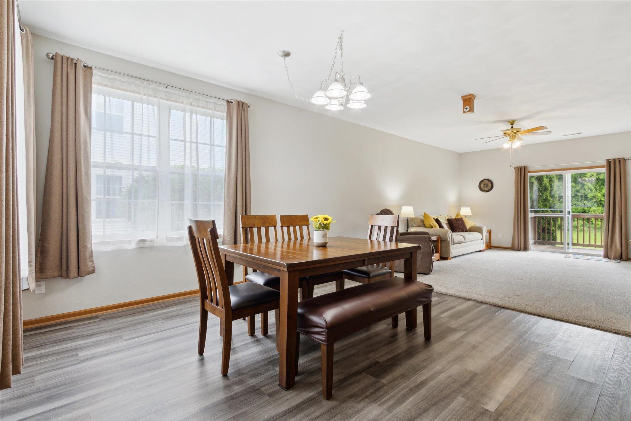 10156 Metalmark Lane, Unit 2 Roscoe, IL 61073 - Photo 11 of 38 a view of a livingroom with furniture window and wooden floor