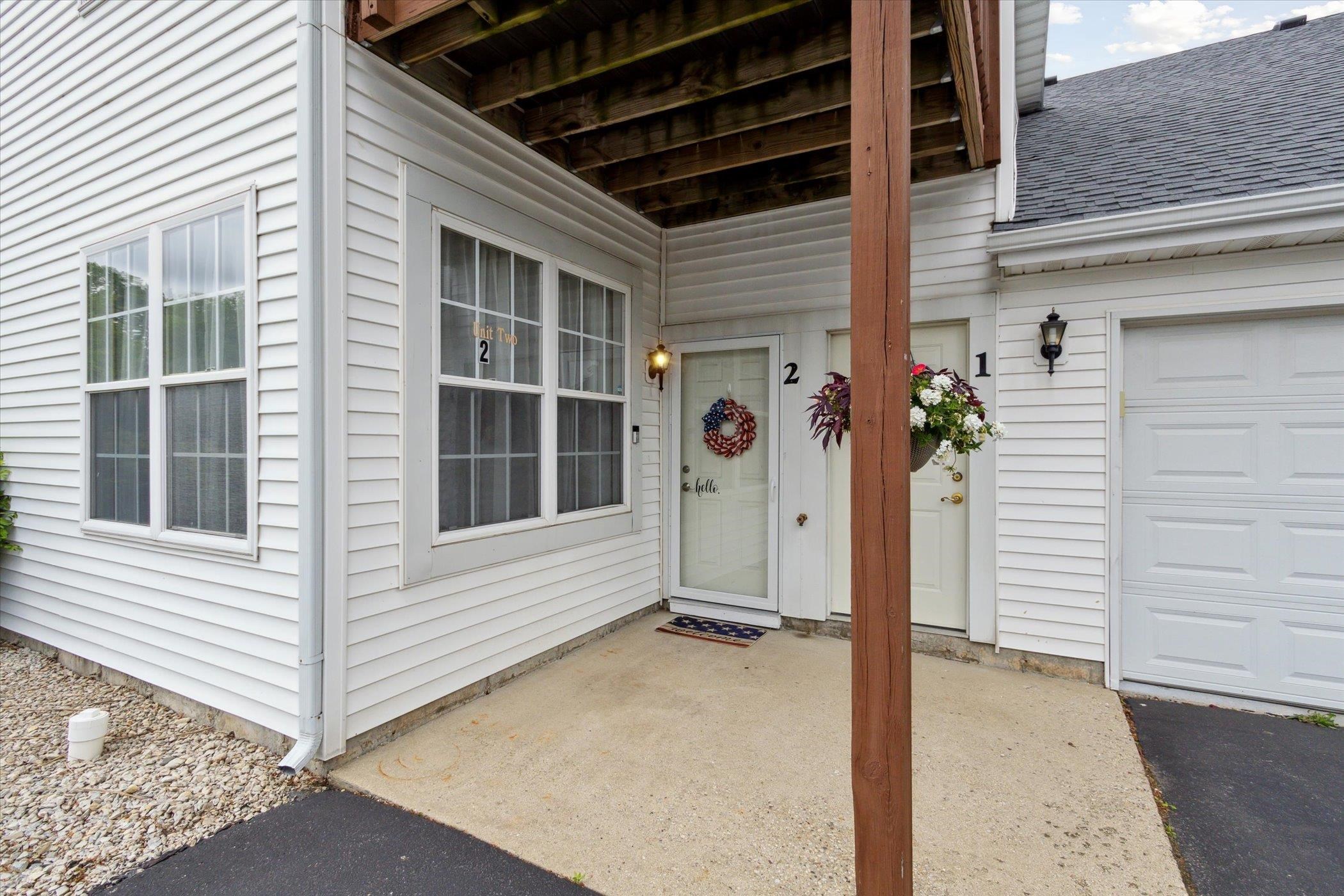 10156 Metalmark Lane, Unit 2 Roscoe, IL 61073 - Photo 3 of 38 a view of house with garage