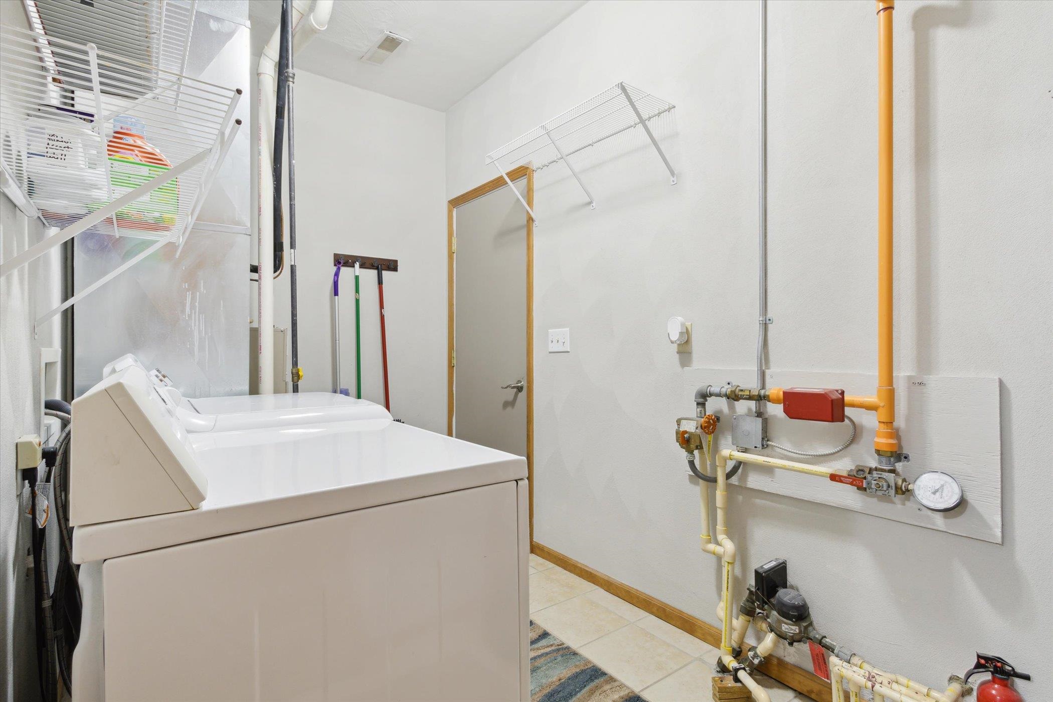 10156 Metalmark Lane, Unit 2 Roscoe, IL 61073 - Photo 32 of 38 a utility room with dryer and washer