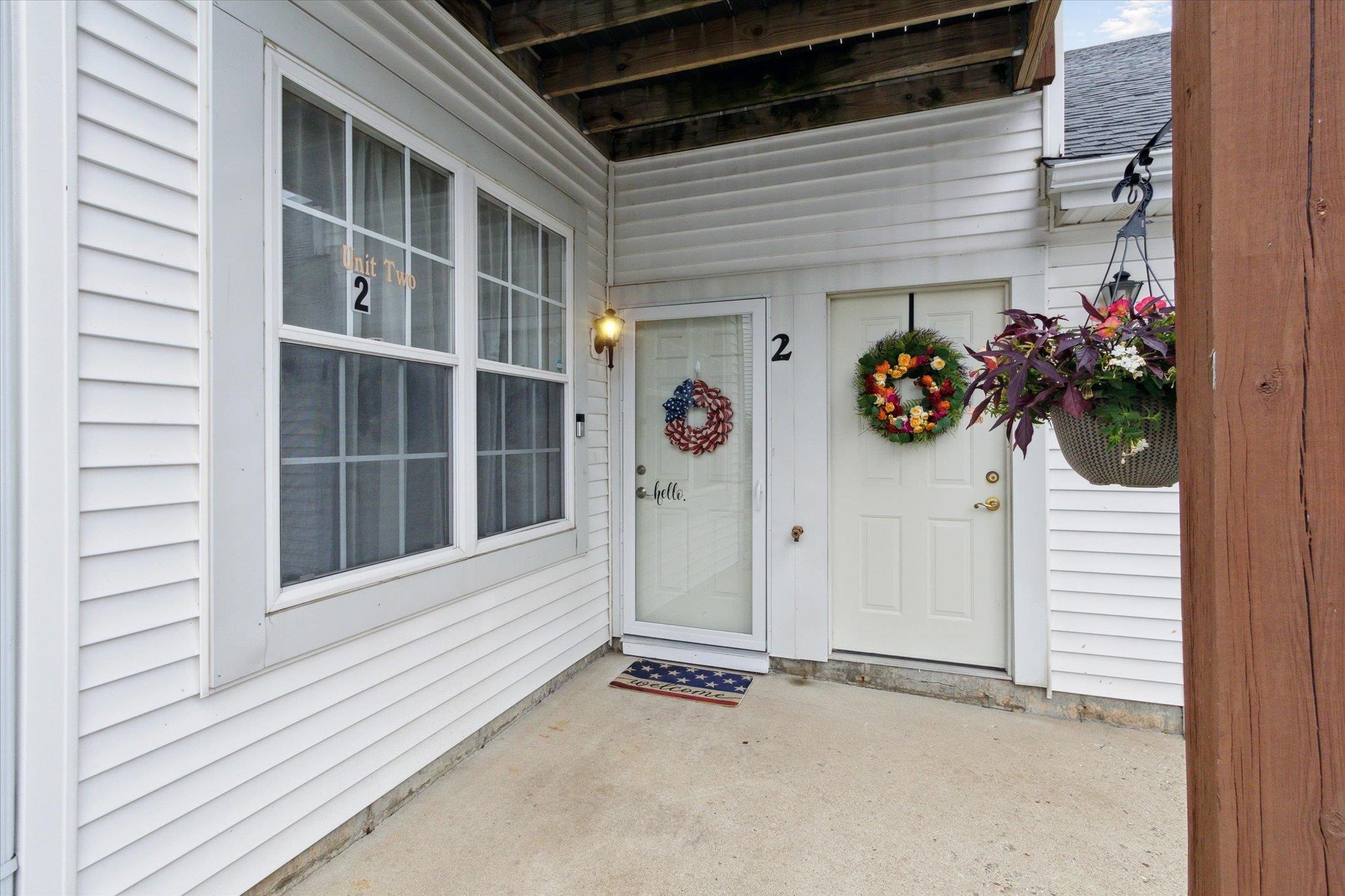 10156 Metalmark Lane, Unit 2 Roscoe, IL 61073 - Photo 4 of 38 a view of a house with a window