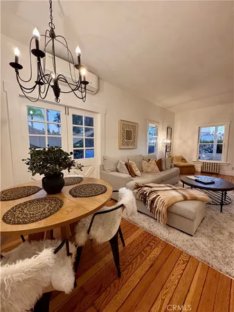 a view of a livingroom with furniture and a table