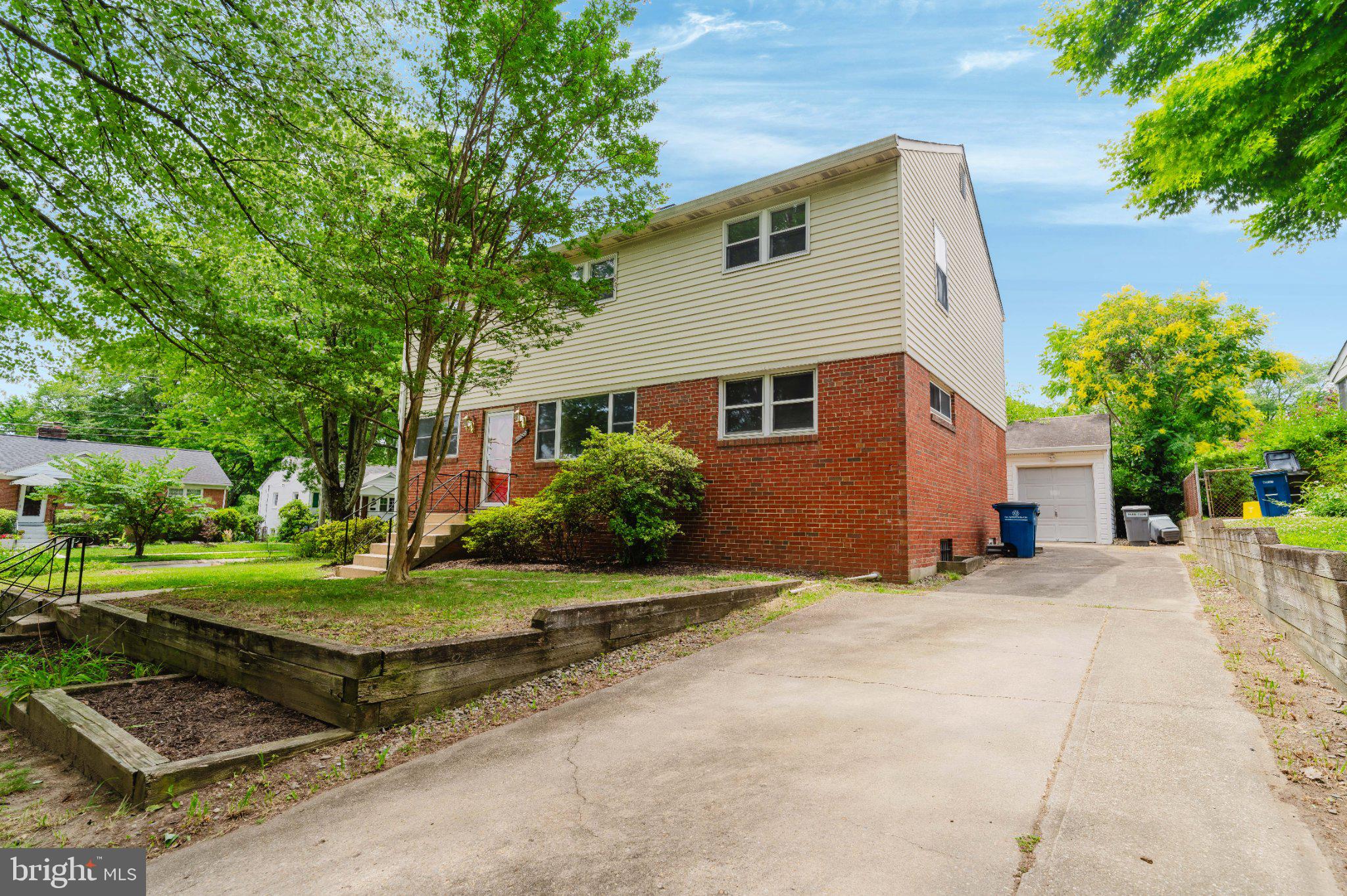 10200 Duvawn Place Silver Spring, MD 20902 - Photo 42 of 42 Charming home with lush greenery.