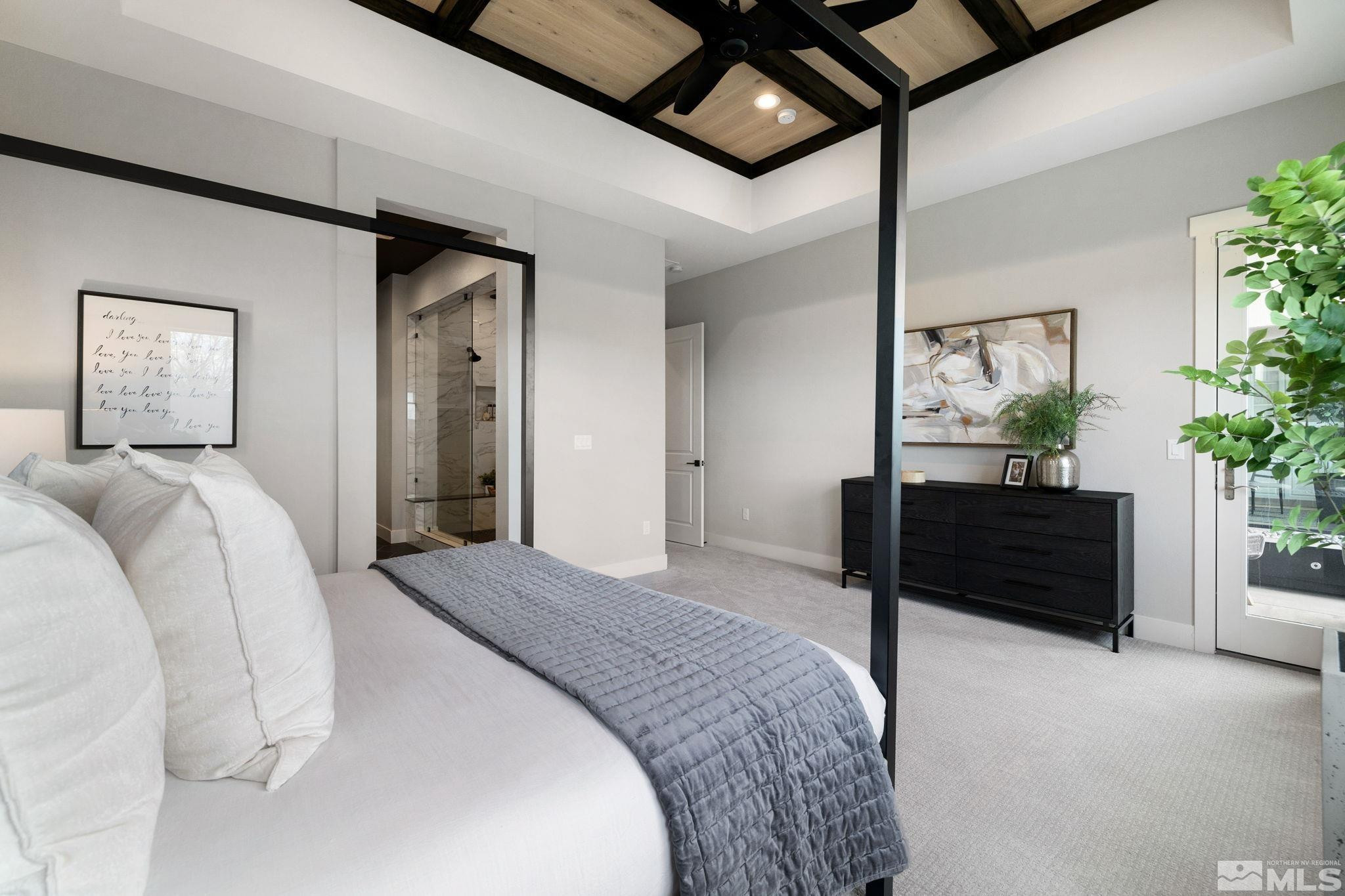 2913 Ruby Desert Drive Reno, NV 89521 - Photo 19 of 39 a bed room with a bed and a potted plant