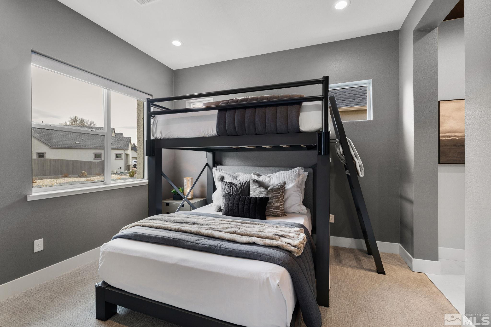 2913 Ruby Desert Drive Reno, NV 89521 - Photo 25 of 39 a bedroom with a bed and a window