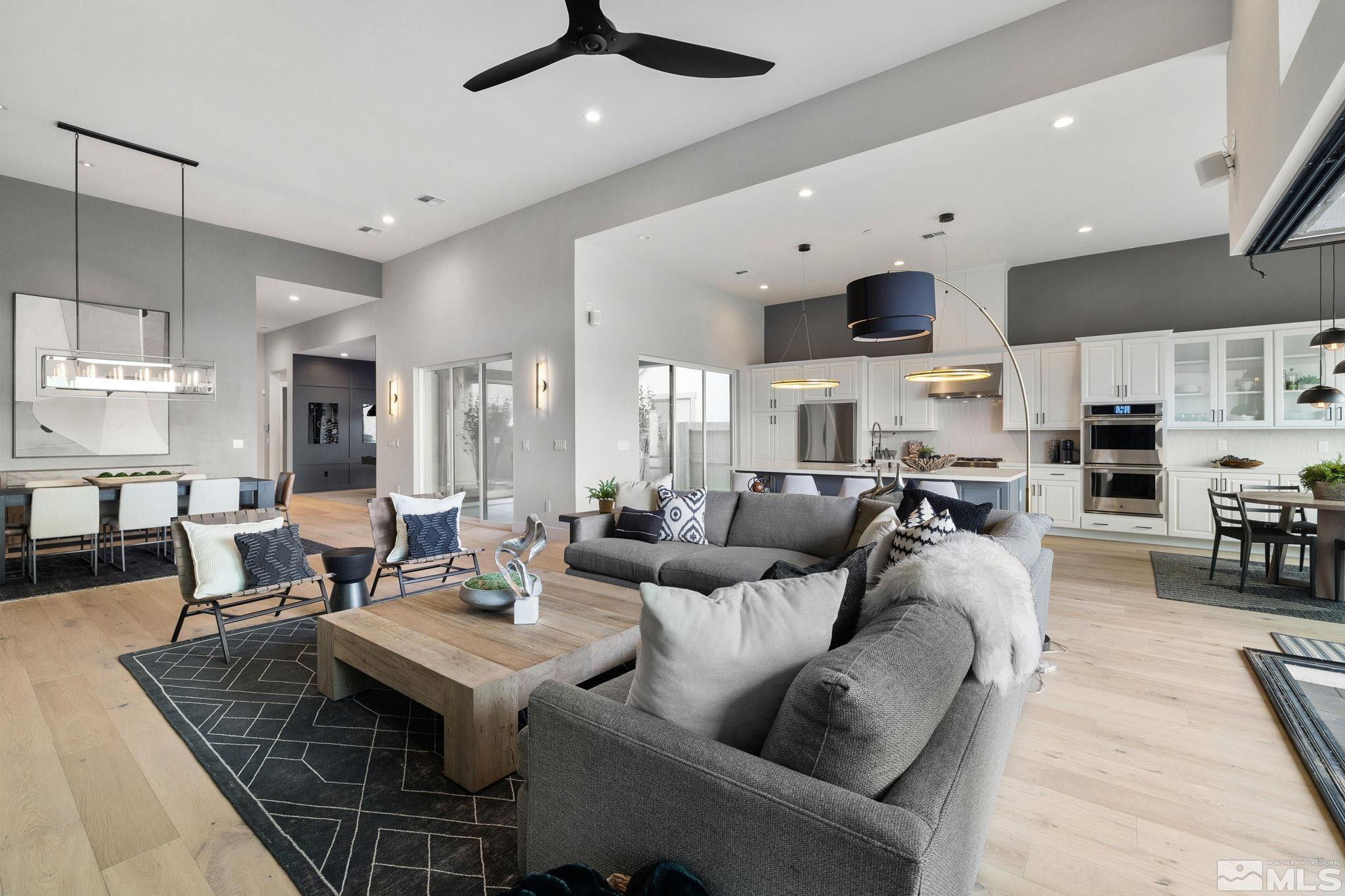 2913 Ruby Desert Drive Reno, NV 89521 - Photo 3 of 39 a living room with lots of furniture and kitchen view