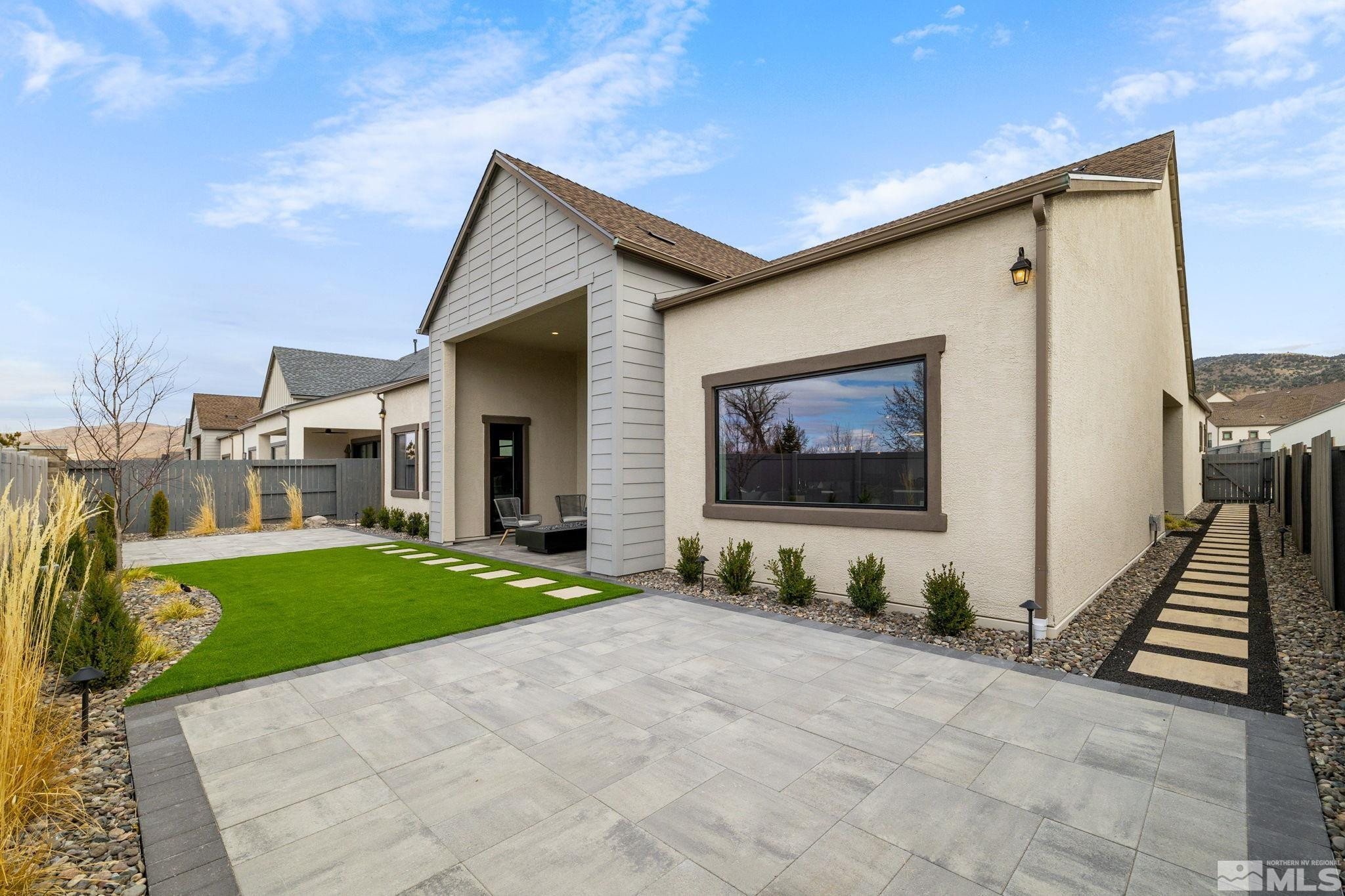 2913 Ruby Desert Drive Reno, NV 89521 - Photo 33 of 39 a front view of a house with a yard