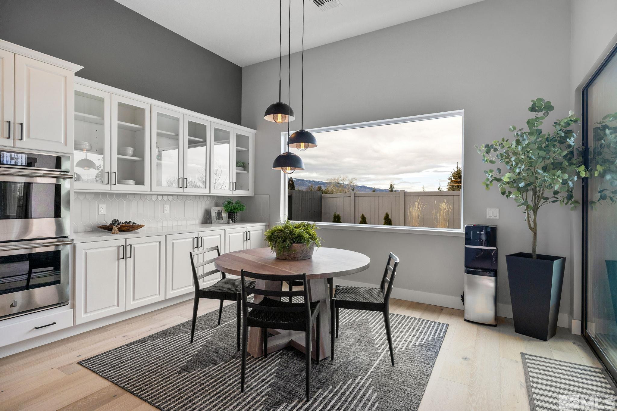 2913 Ruby Desert Drive Reno, NV 89521 - Photo 7 of 39 a view of a dining room with furniture window and outside view