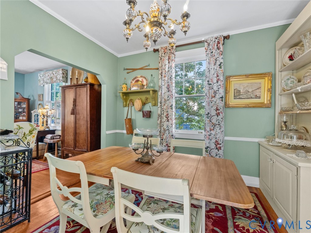 1812 Seddon Road Richmond, VA 23227 - Photo 15 of 56 Dining area with a decorative chandelier, crown mo