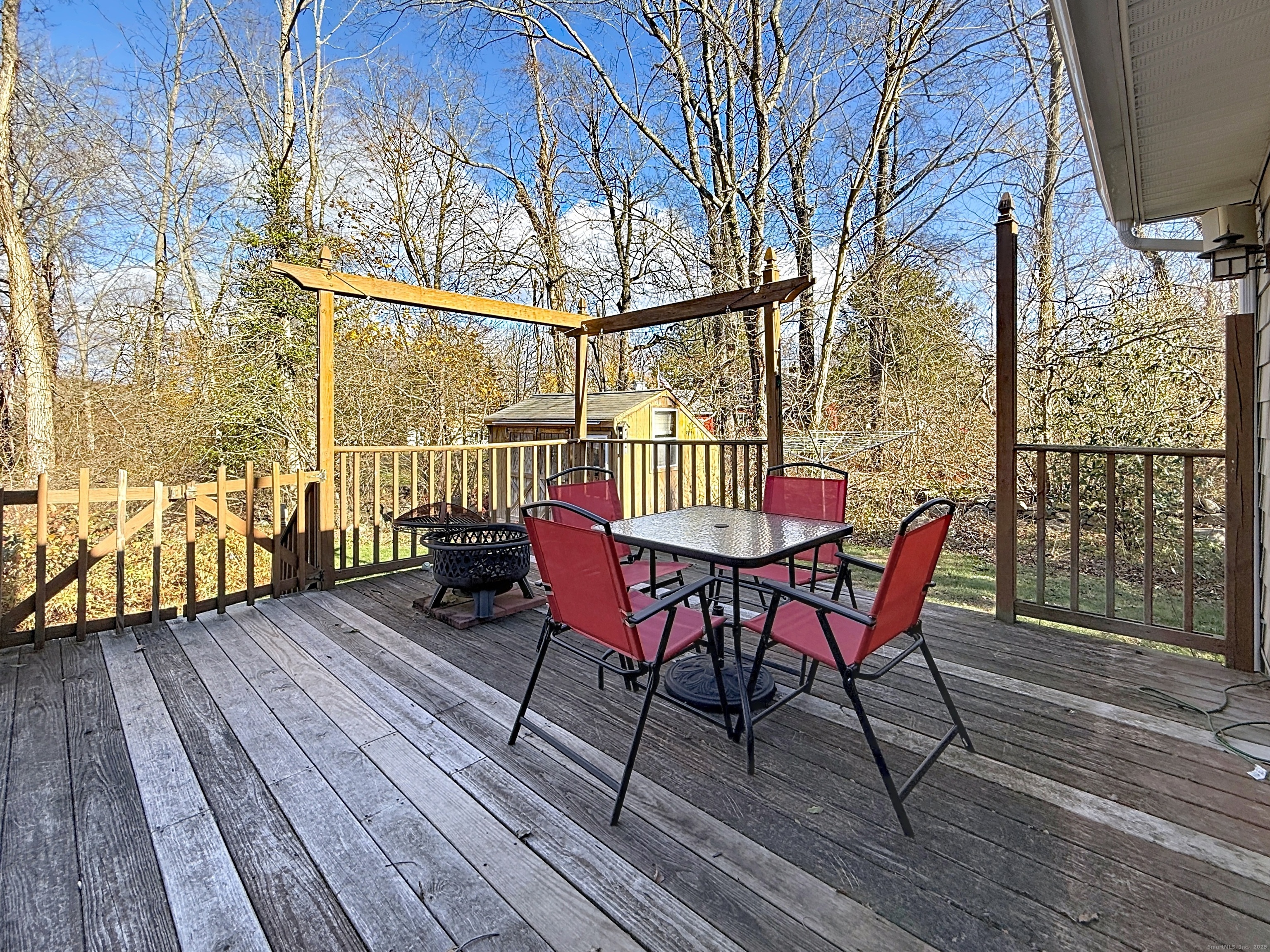 198 Forest Road Coventry, CT 06238 - Photo 21 of 24 a view of a chairs on the deck