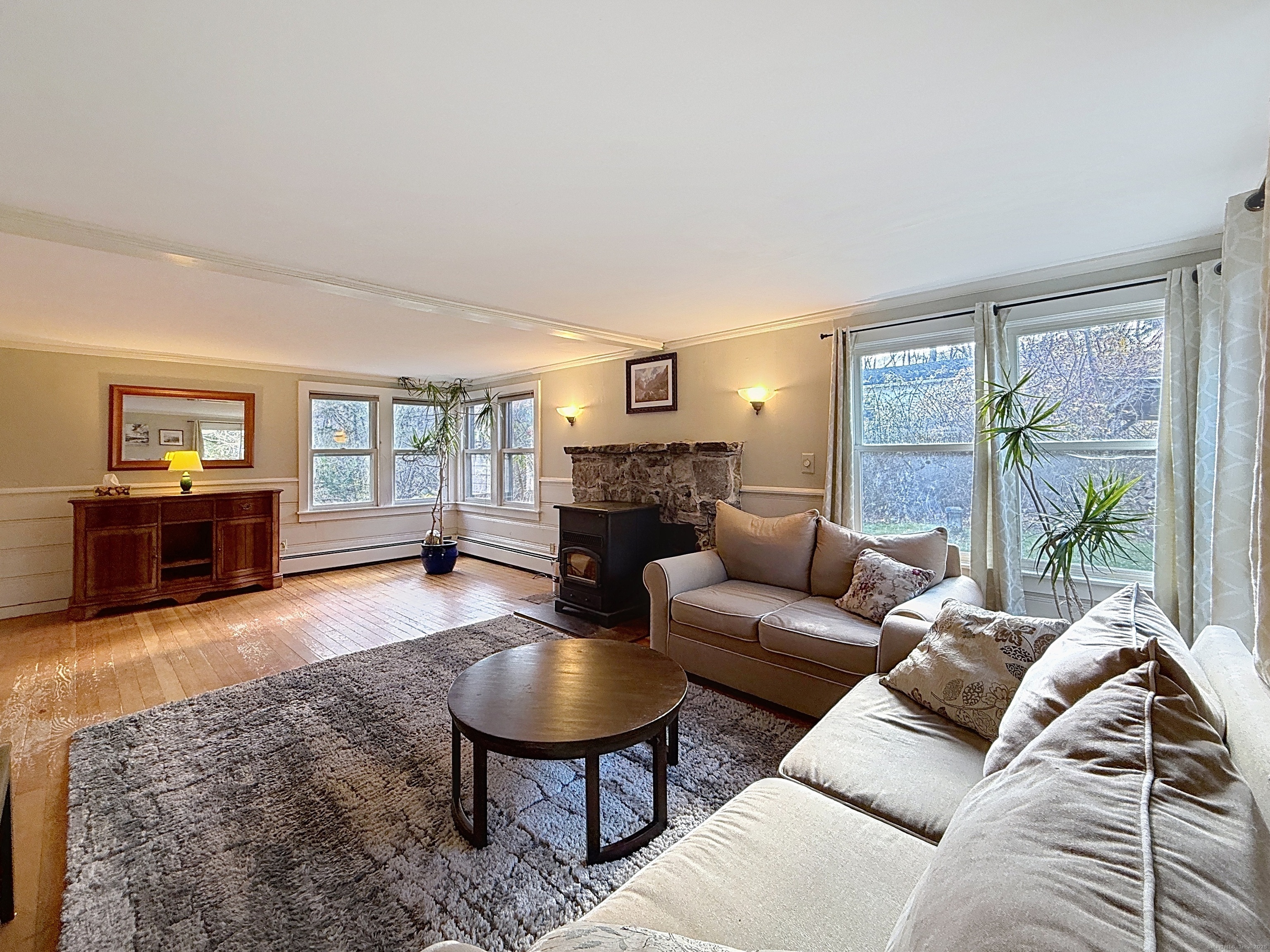 198 Forest Road Coventry, CT 06238 - Photo 7 of 24 a living room with furniture and a fireplace