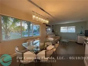 a kitchen with a refrigerator a sink and a refrigerator