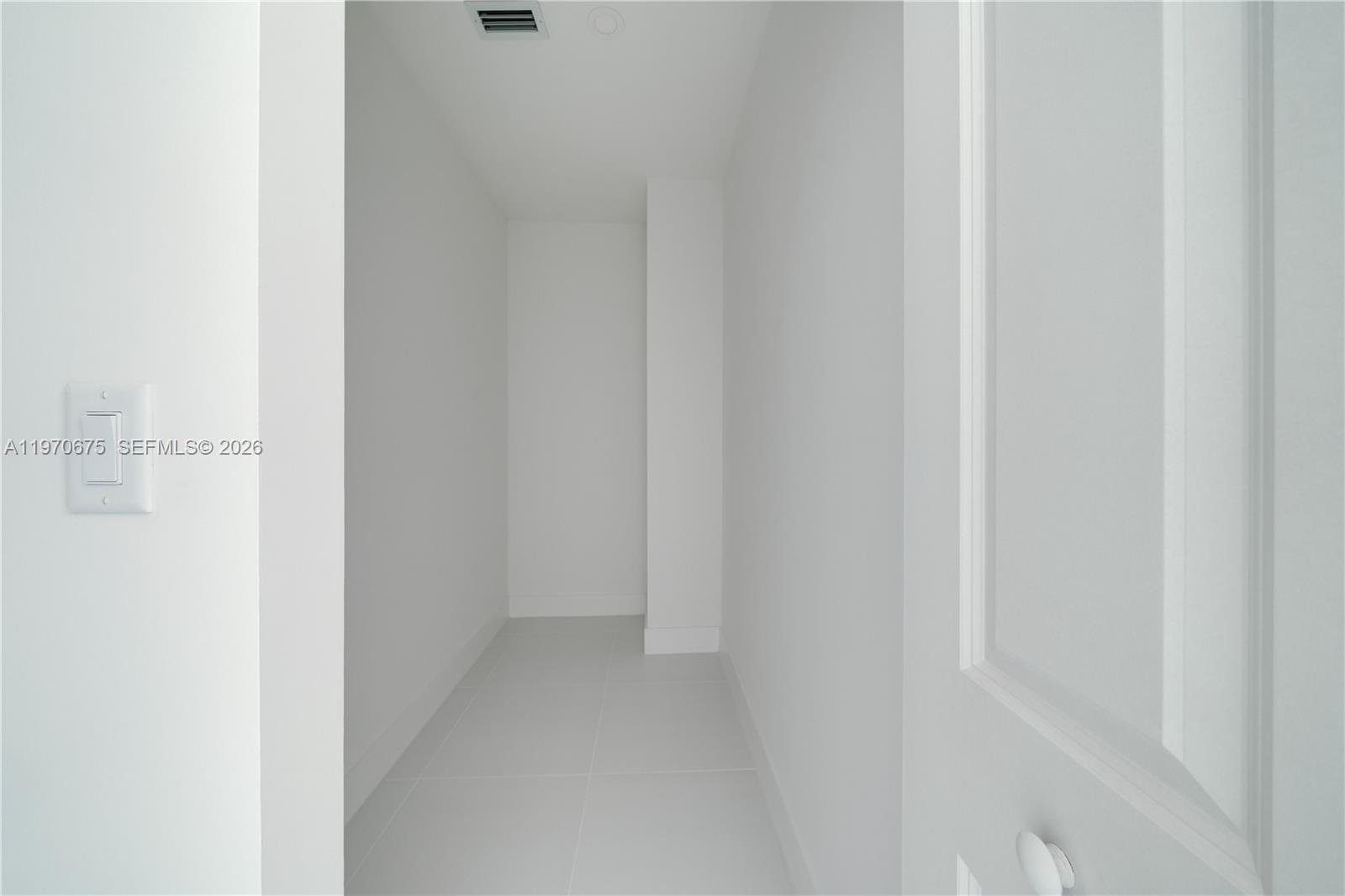 4789 Northwest 1st Street Miami, FL 33126 - Photo 22 of 28 a view of a hallway