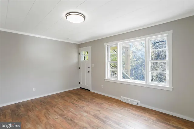 an empty room with windows