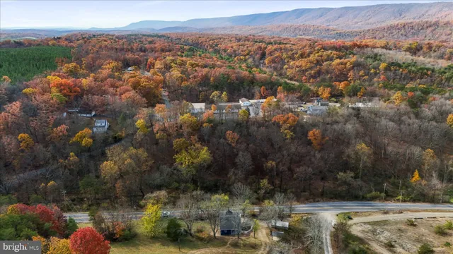 an aerial view of residential house with outdoor space