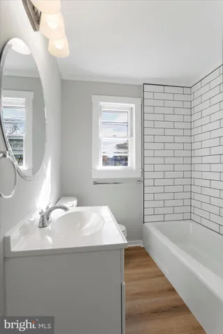a bathroom with a sink and a bathtub