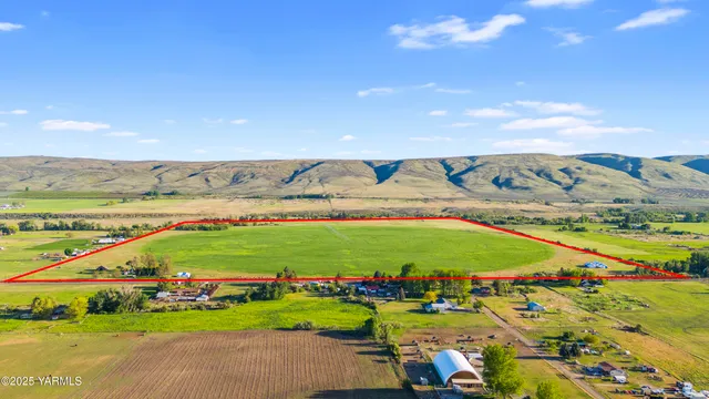 a view of an ocean and a mountain