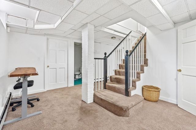 a view of an entryway and livingroom