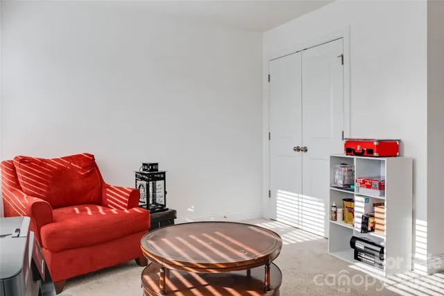 a room with furniture and a window