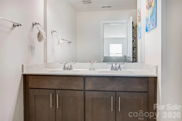 a workspace with furniture and a book shelf