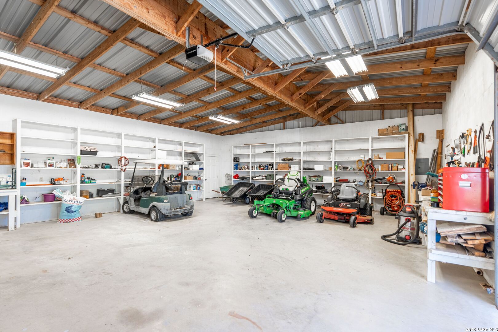 840 County Road 2250 Riviera, TX 78379 - Photo 11 of 45 a view of a garage with a lot of stuff and furniture