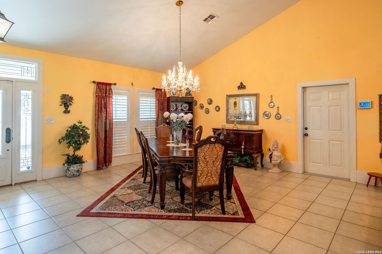 840 County Road 2250 Riviera, TX 78379 - Photo 22 of 45 a view of a dining room with furniture and a chandelier
