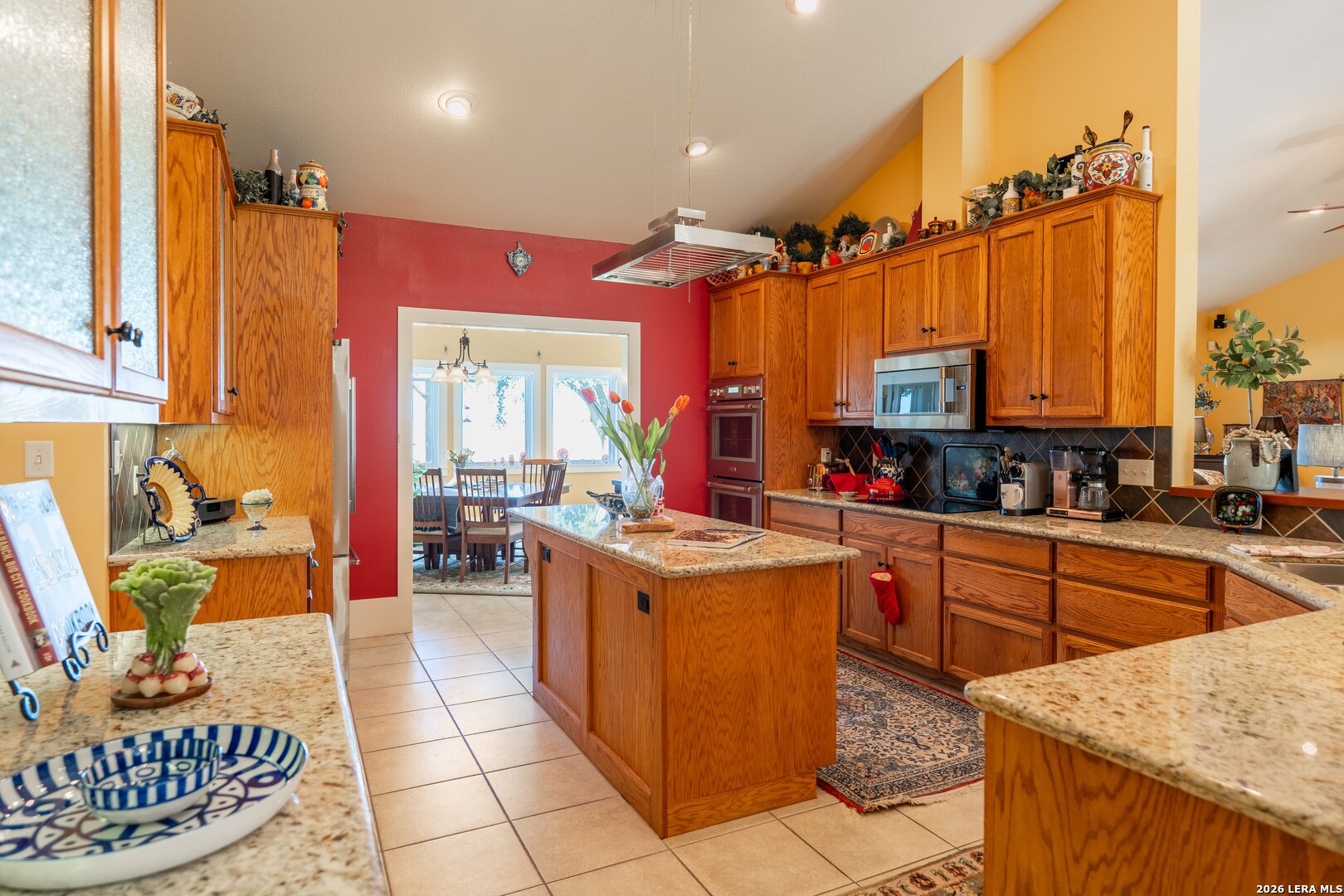 840 County Road 2250 Riviera, TX 78379 - Photo 25 of 45 a kitchen with stainless steel appliances granite countertop a stove a sink and a microwave