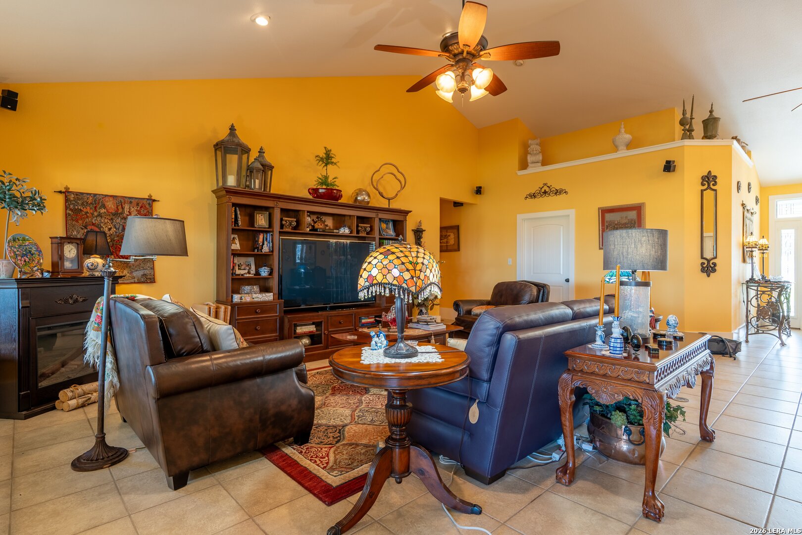 840 County Road 2250 Riviera, TX 78379 - Photo 27 of 45 a living room with furniture a chandelier and a piano