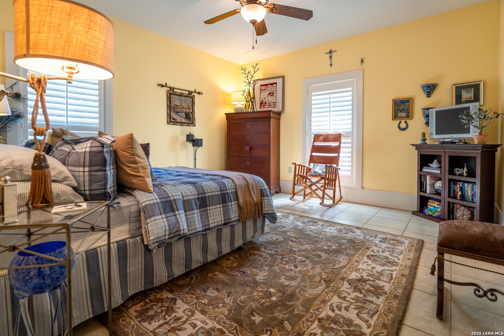 840 County Road 2250 Riviera, TX 78379 - Photo 33 of 45 a bedroom with bed and a chandelier