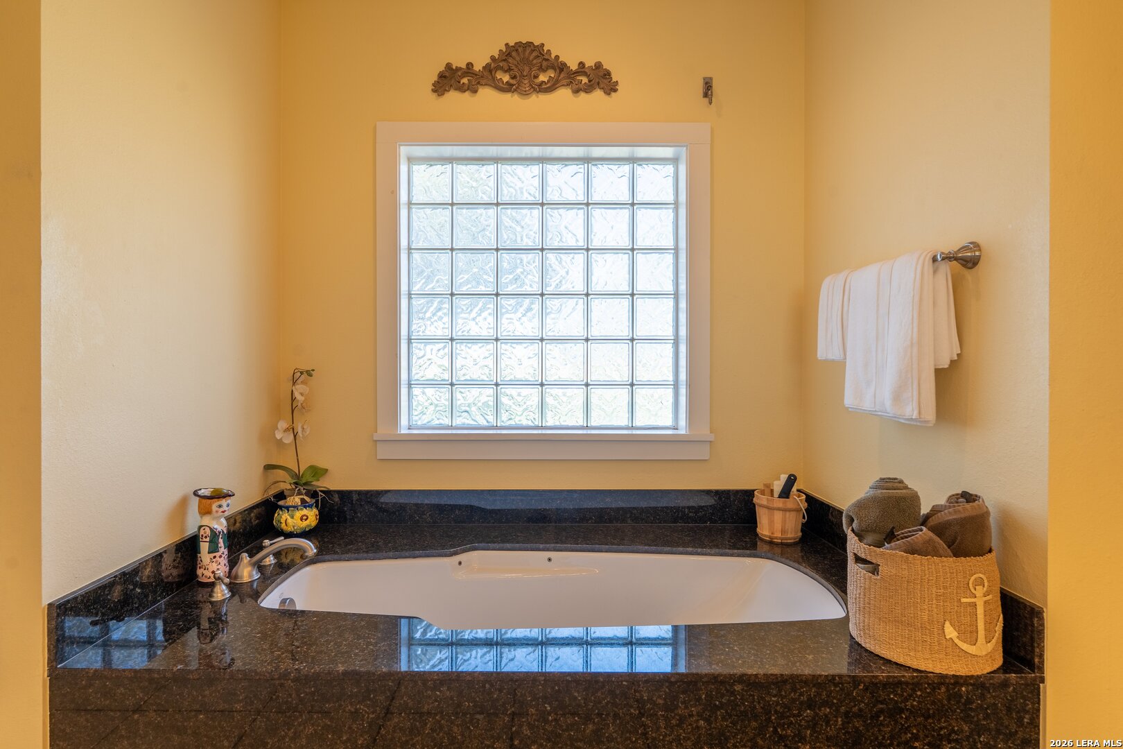 840 County Road 2250 Riviera, TX 78379 - Photo 36 of 45 a bath tub sitting in a bathroom next to a window