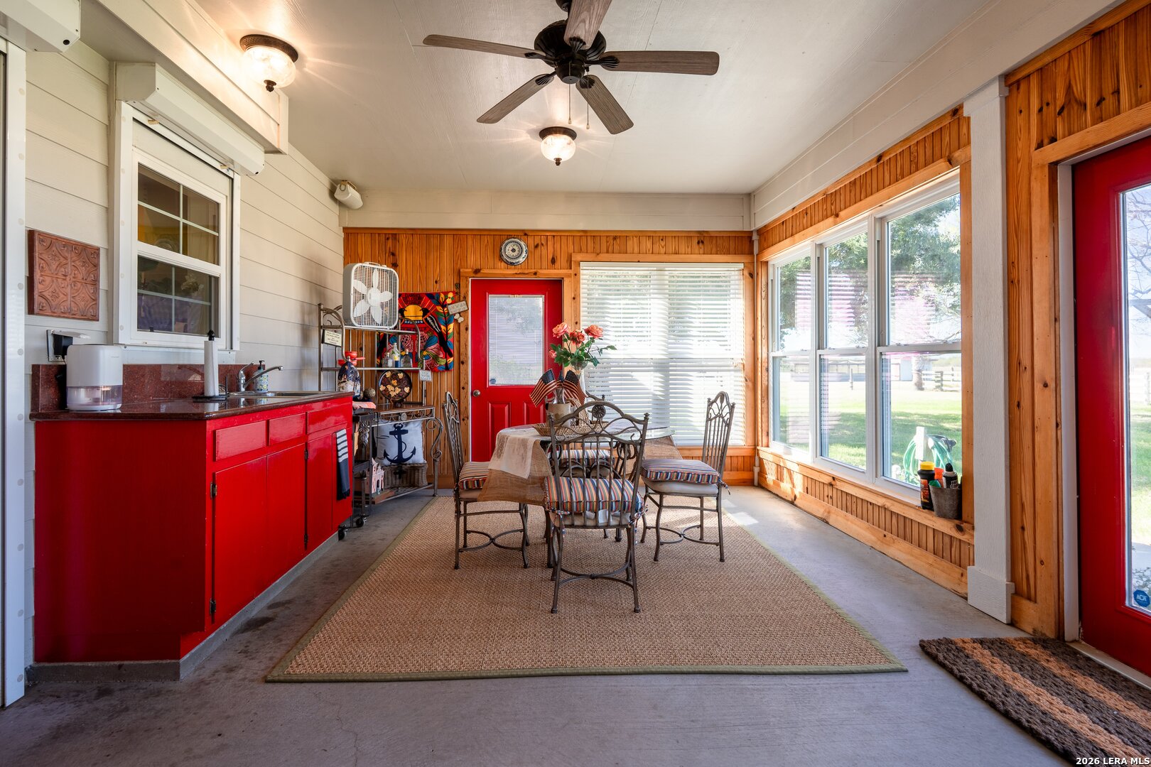 840 County Road 2250 Riviera, TX 78379 - Photo 39 of 45 a dining room with furniture a chandelier and a rug