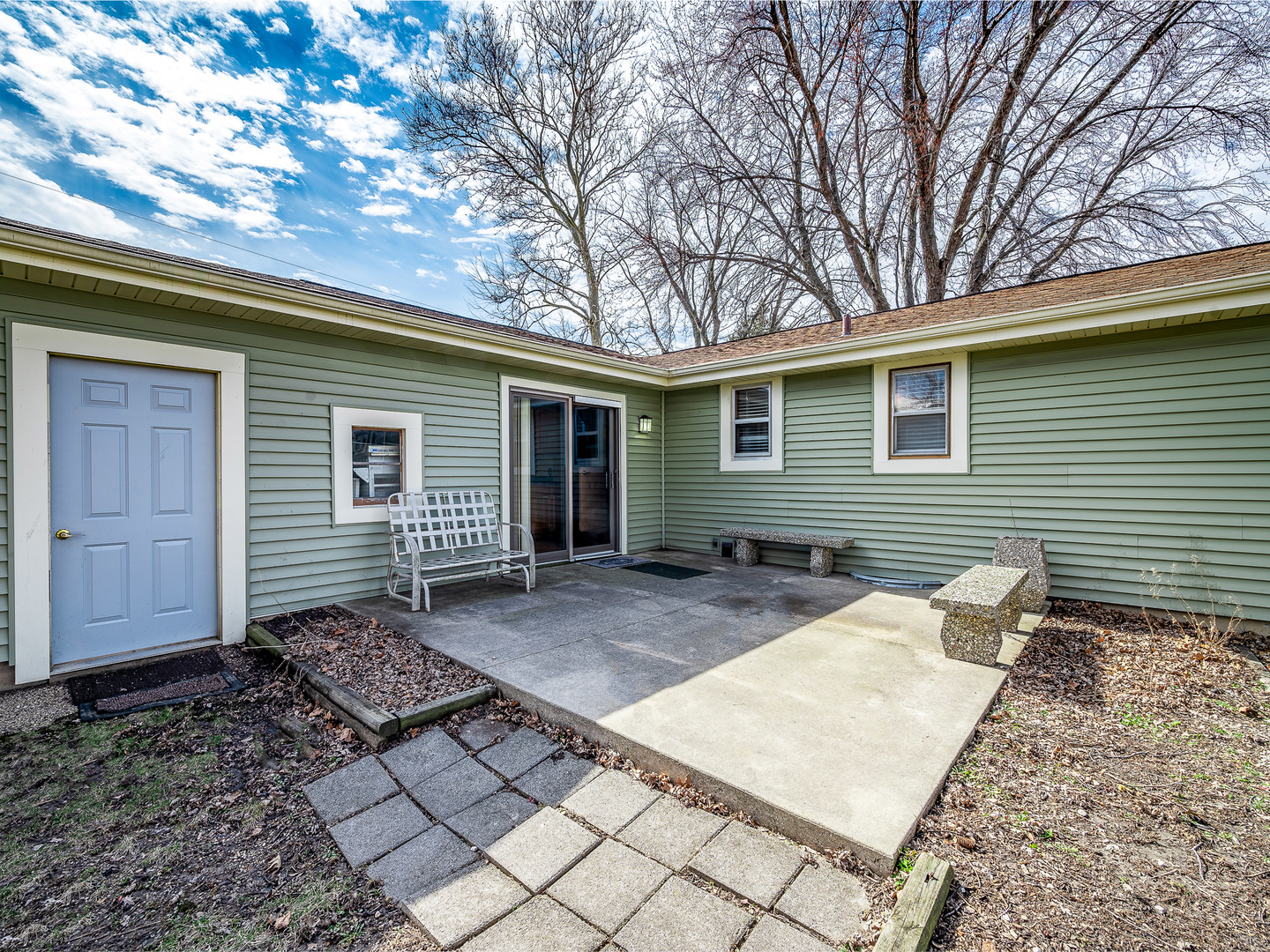 10235 Rich Road DeKalb, IL 60115 - Photo 5 of 21 a view of a backyard with a large tree