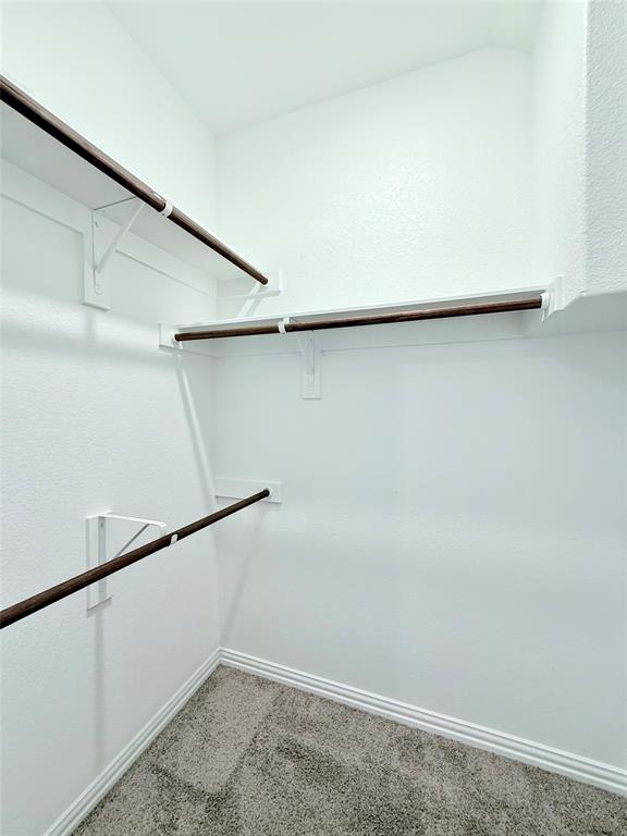 1336 Morning View Road Georgetown, TX 78628 - Photo 30 of 40 Ample hanging space and shelving await in this well-appointed closet.