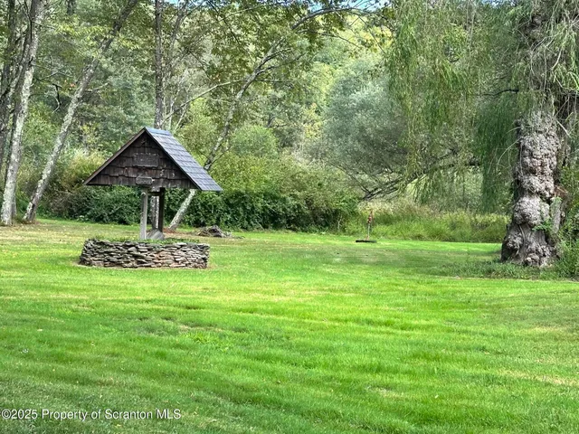 a view of a golf course with a big yard
