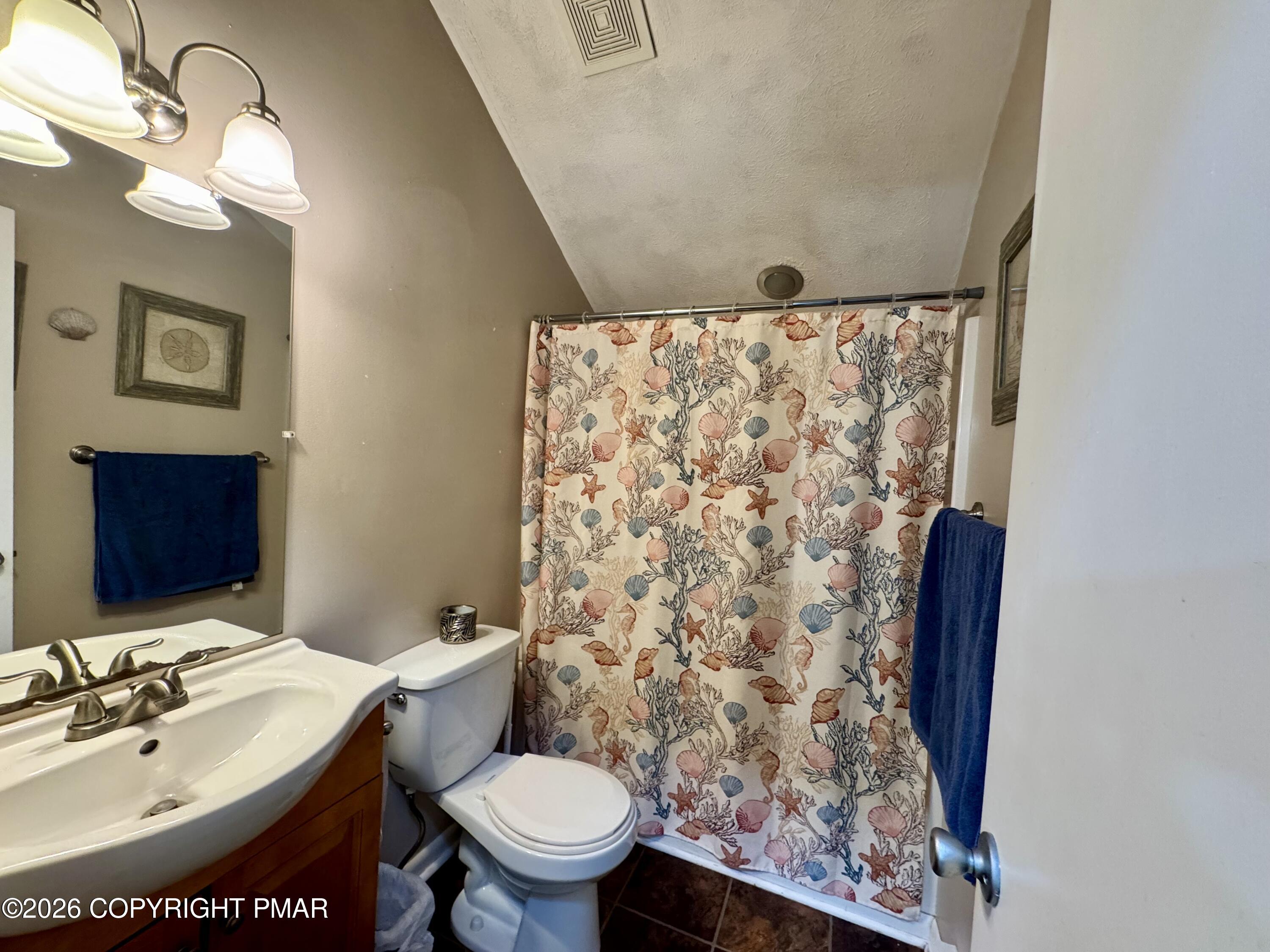 1169 Coolbaugh Road East Stroudsburg, PA 18302 - Photo 19 of 26 a bathroom with a sink toilet and shower