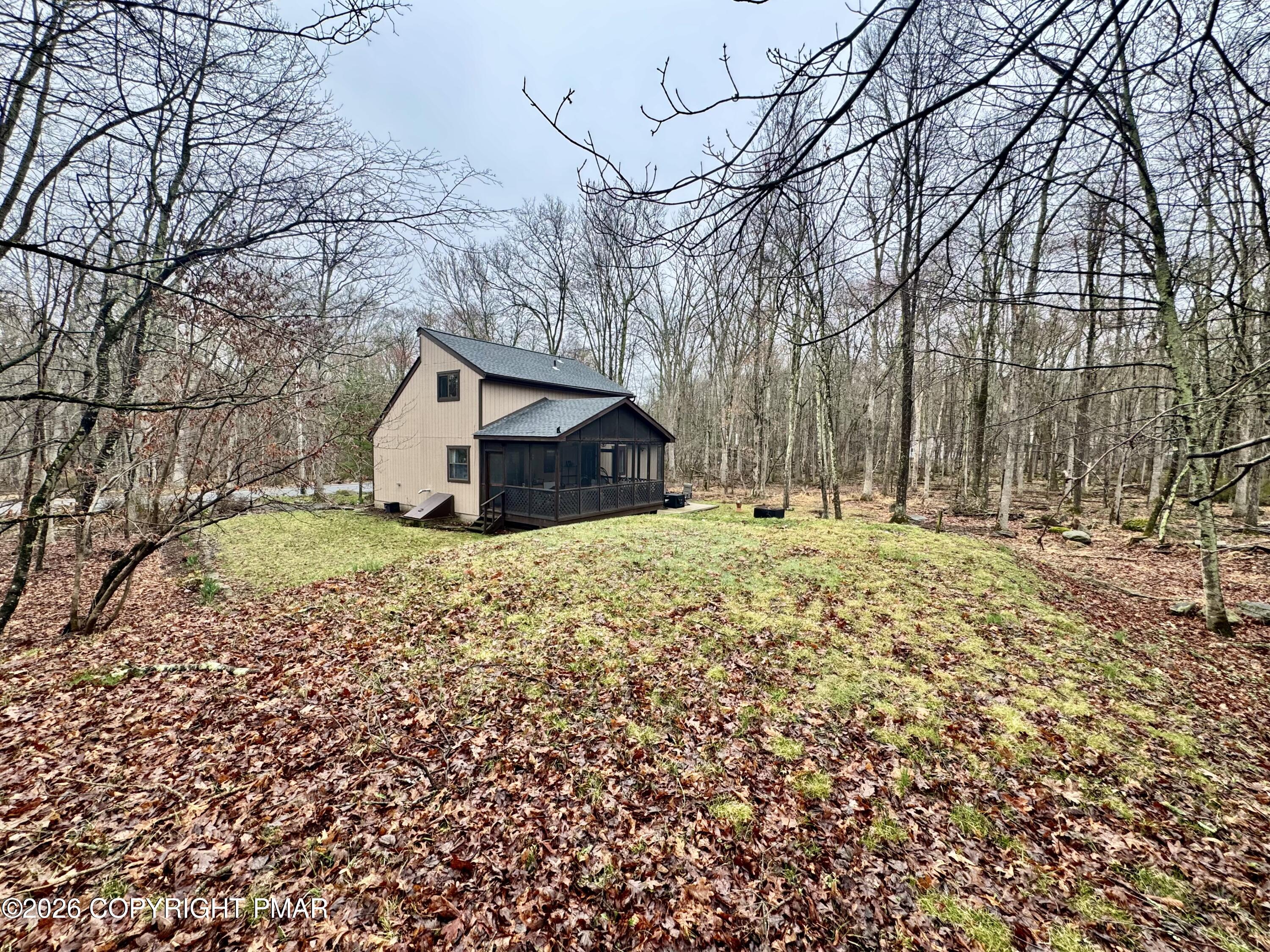 1169 Coolbaugh Road East Stroudsburg, PA 18302 - Photo 23 of 26 a view of a house with a yard