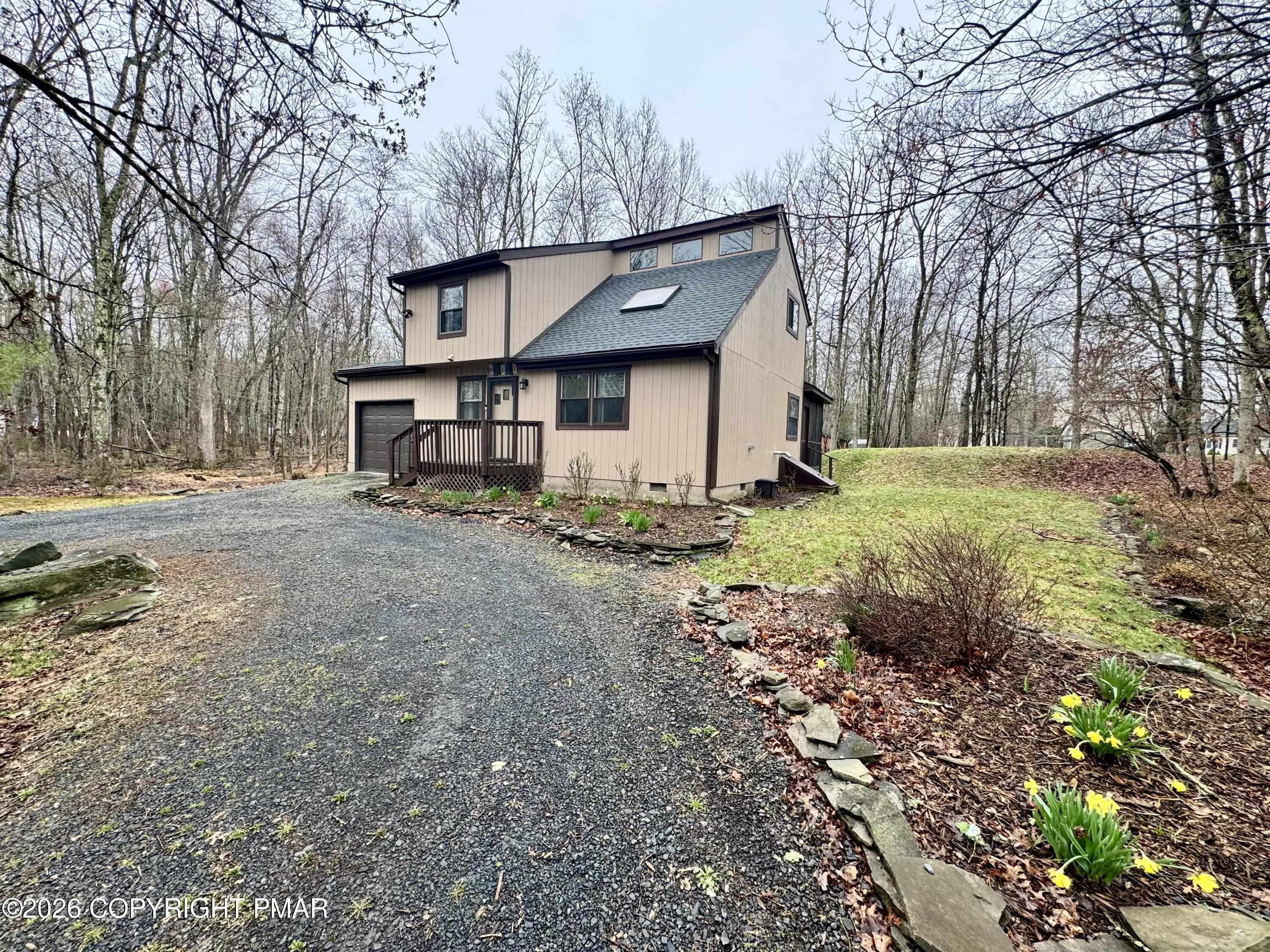 1169 Coolbaugh Road East Stroudsburg, PA 18302 - Photo 3 of 26 a house view with a backyard space