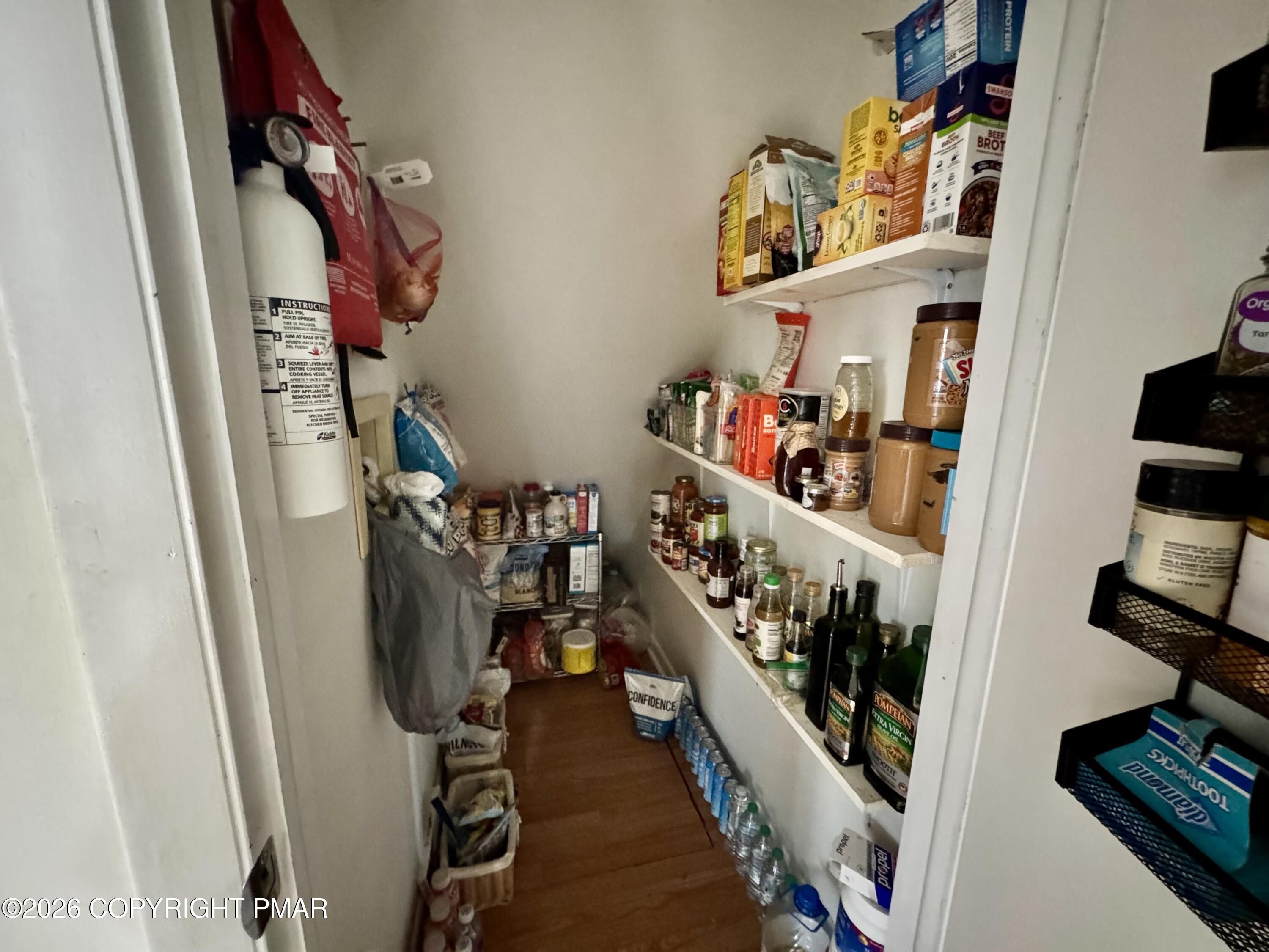 1169 Coolbaugh Road East Stroudsburg, PA 18302 - Photo 6 of 26 a view of walk in closet with clothes and shoes