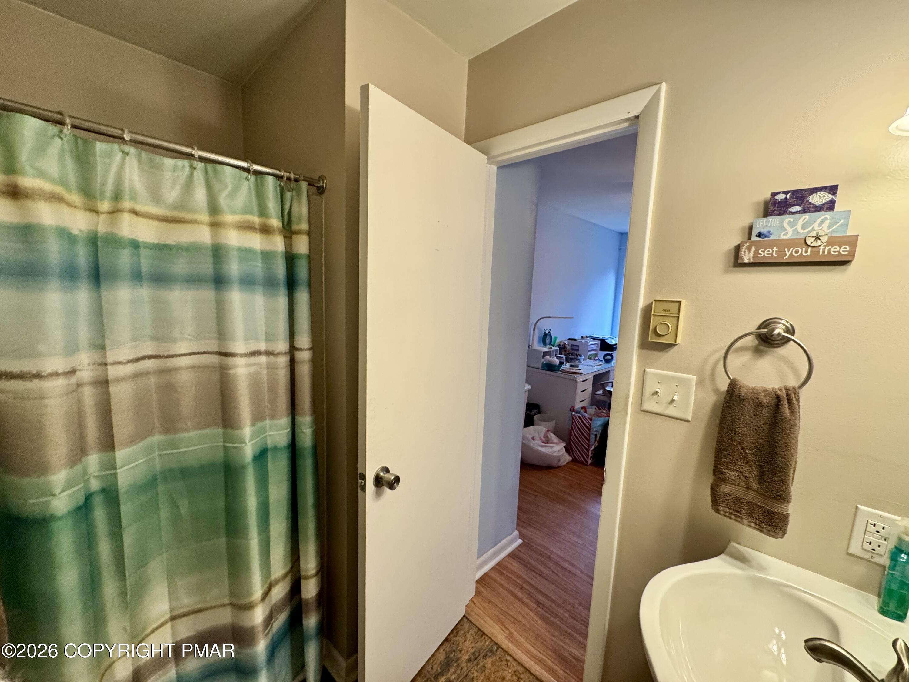 1169 Coolbaugh Road East Stroudsburg, PA 18302 - Photo 10 of 26 a bathroom with a sink toilet and shower