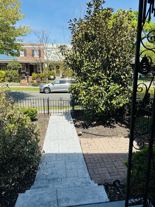 1911 D Street Northeast Washington, DC 20002 - Photo 2 of 63 Front sidewalk looking away from house