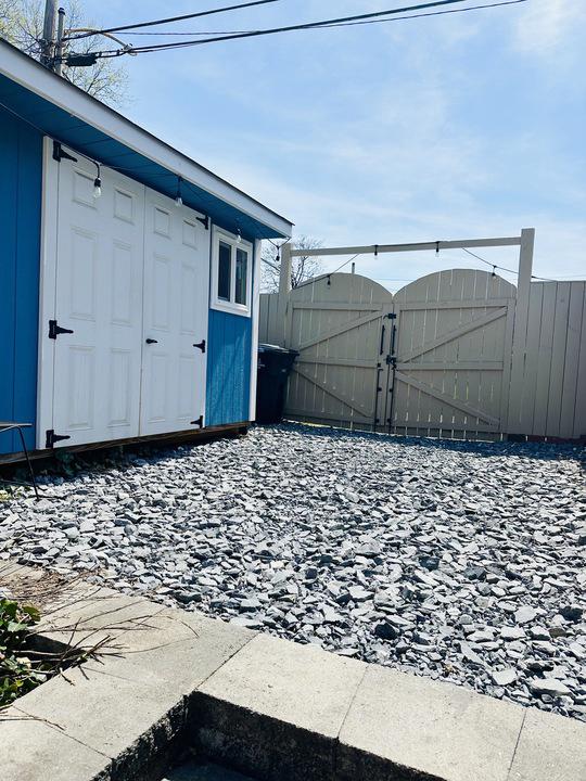 1911 D Street Northeast Washington, DC 20002 - Photo 57 of 63 Storage shed and crushed rock parking pad