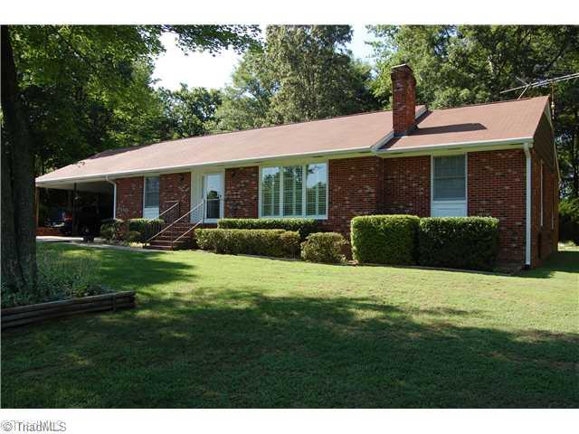 6051 Whites Chapel Road Staley, NC 27355 - Photo 1 of 15 Exterior Front.