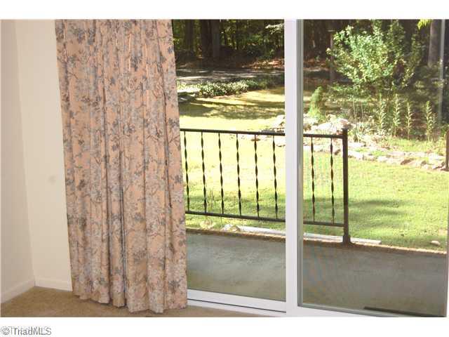 6051 Whites Chapel Road Staley, NC 27355 - Photo 5 of 15 Den/Family/Great Room. Den leading out to porch