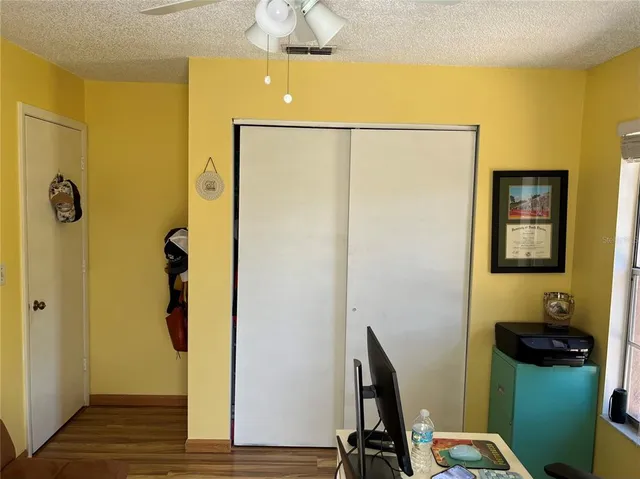 a black and white house with a outdoor space