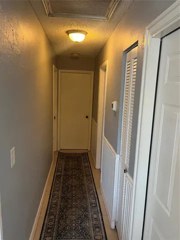 a work room with furniture and a window