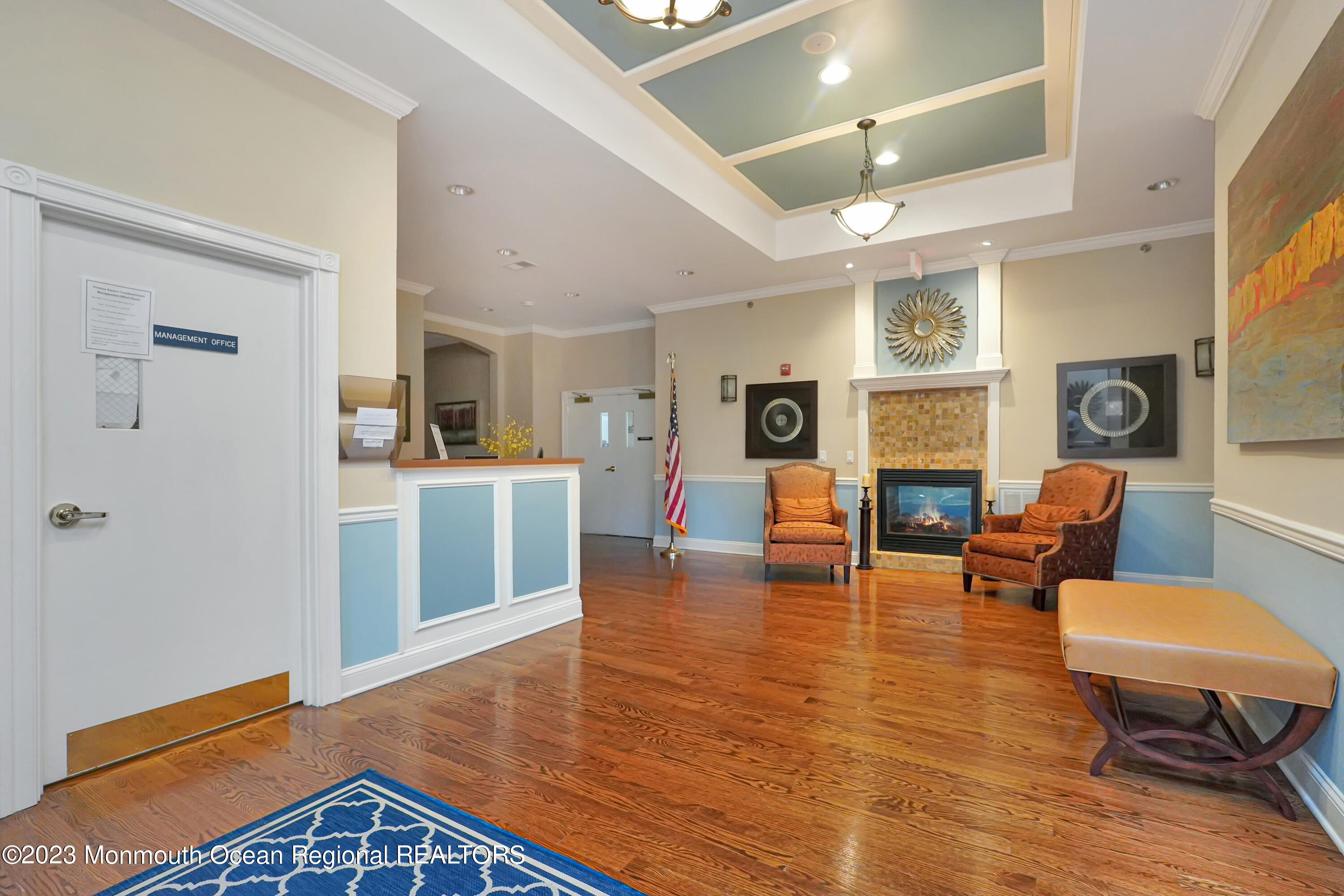 211 Potts Road Morganville, NJ 07751 - Photo 28 of 29 a living room with furniture and a kitchen view
