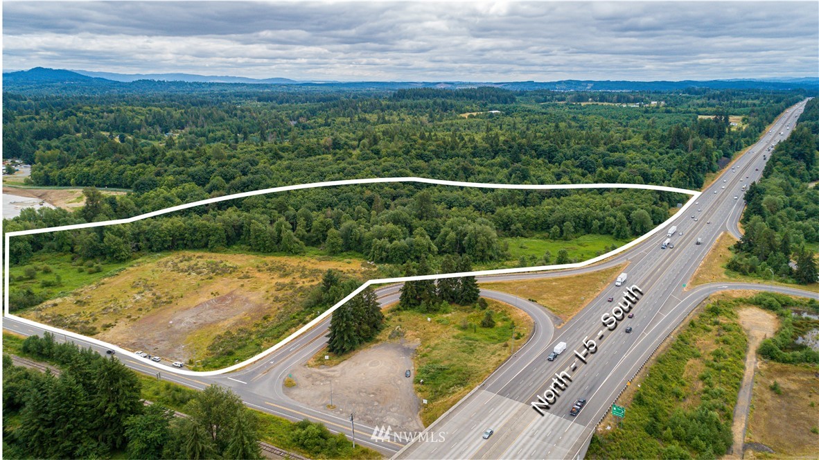 3701 Maytown Road Southwest Tenino, WA 98589 - Photo 2 of 3 a view of a wooden deck with a yard