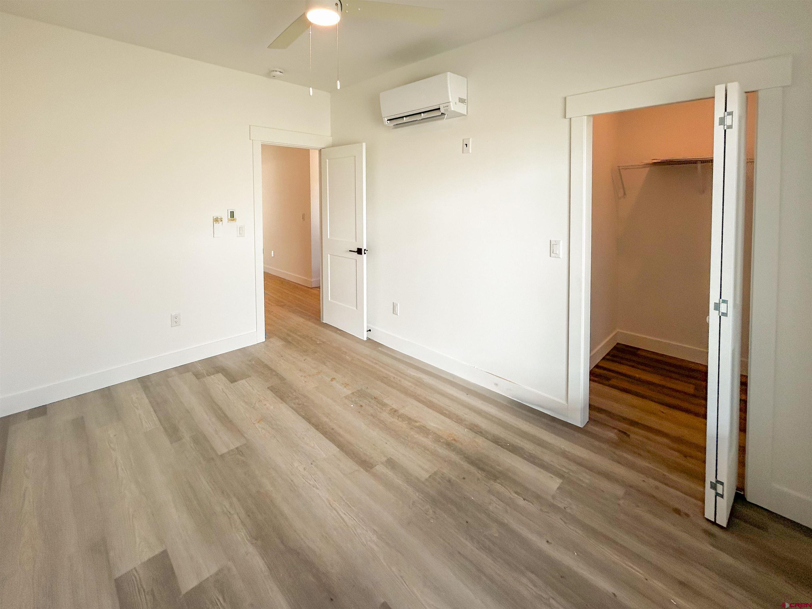 655 5th Street, Unit A Silverton, CO 81433 - Photo 4 of 9 wooden floor in an empty room