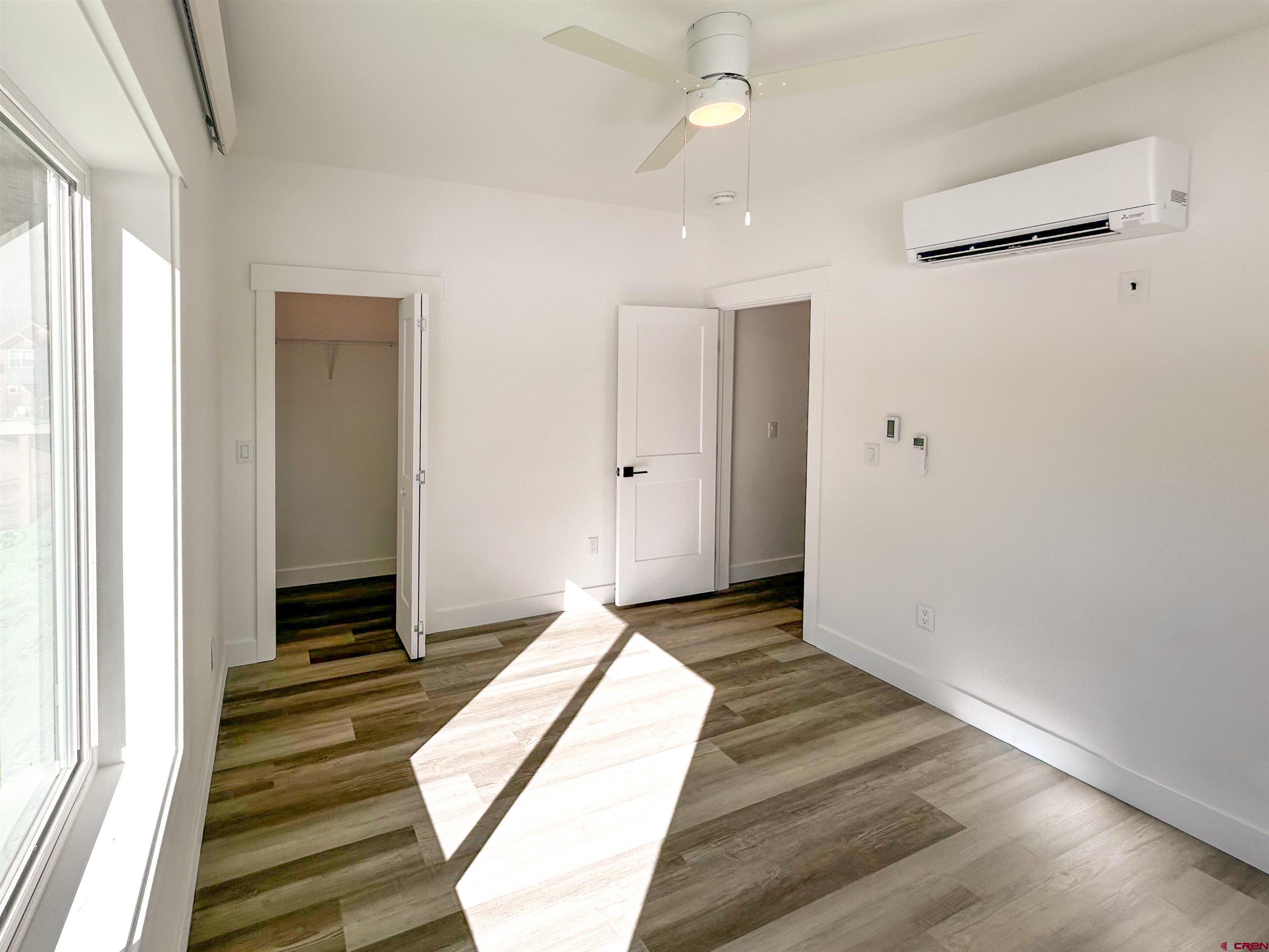 655 5th Street, Unit A Silverton, CO 81433 - Photo 5 of 9 a view of a room with wooden floor and staircase
