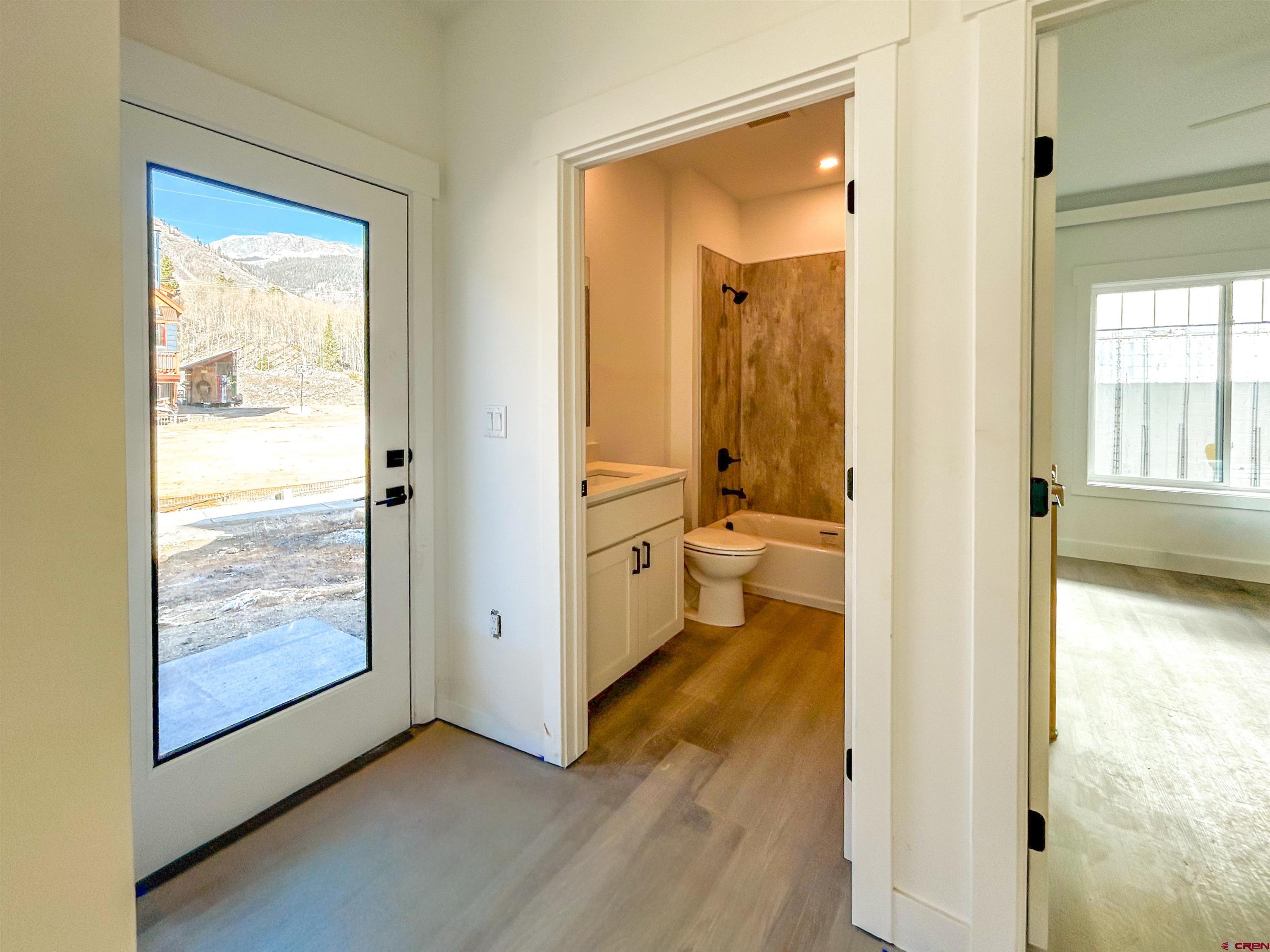 655 5th Street, Unit A Silverton, CO 81433 - Photo 9 of 9 a view of a bathroom with a glass door