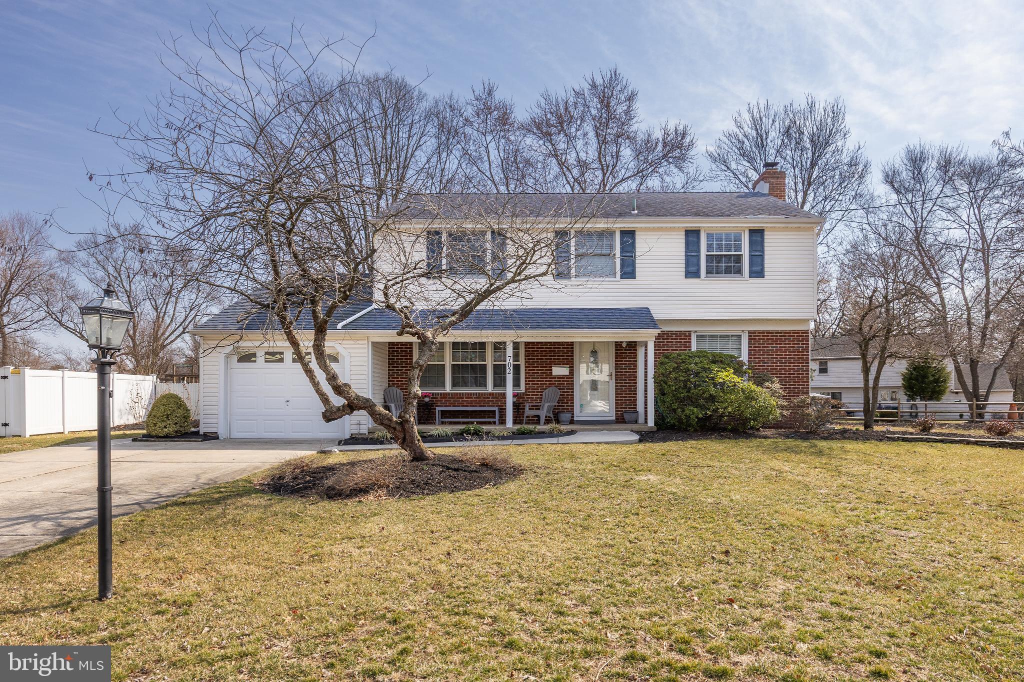 702 Heritage Road Cinnaminson, NJ 08077 - Photo 1 of 30 a view of a house with yard and sitting area